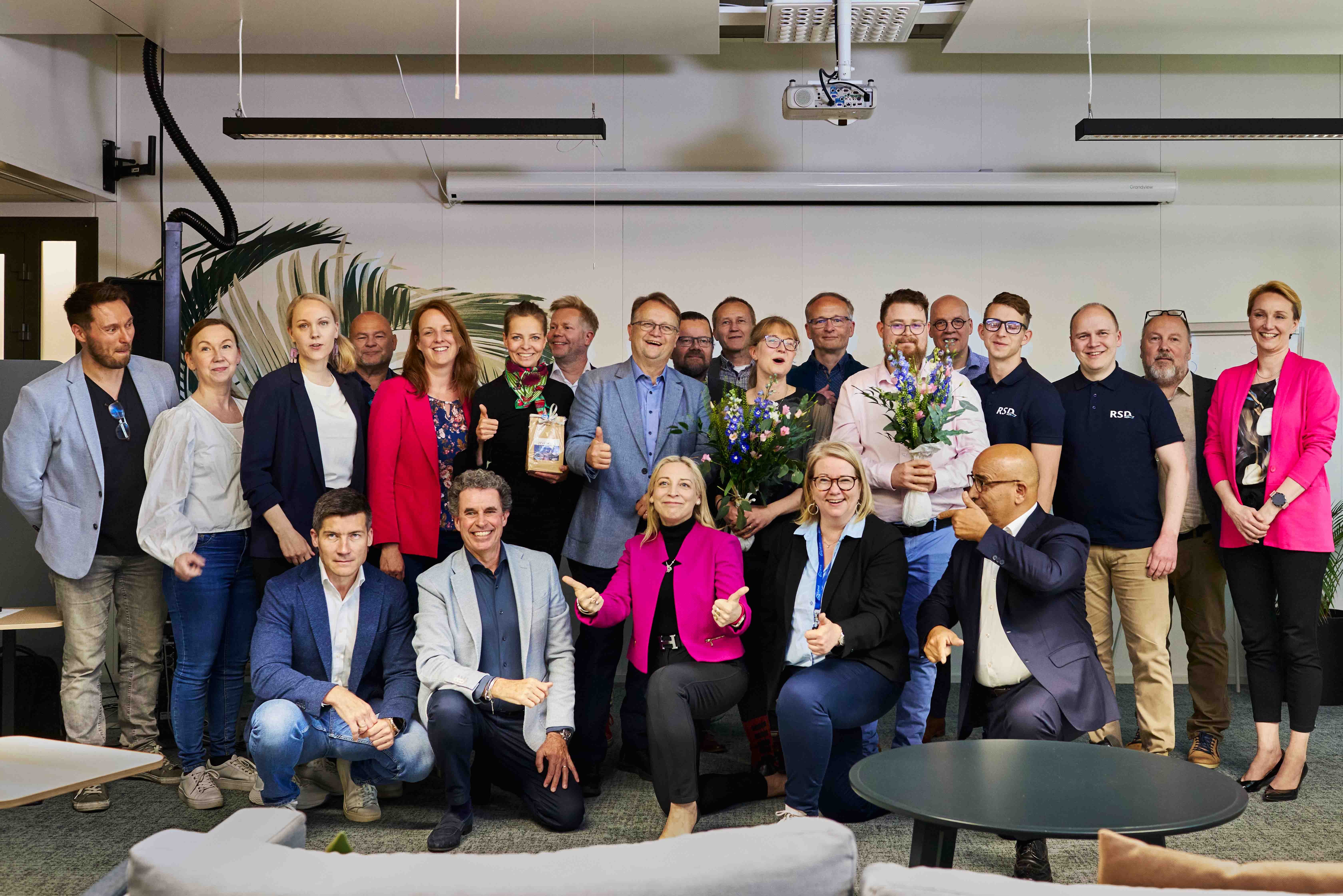 A group of people smiling